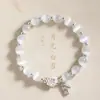 Pulsera de Flor Ojo de Gato para Mujer Nuevo Estilo Chino Fresco Estilo Lujo Ligero Versátil Flor de Loto Nafu Lúcido Marca Pulsera de Loto