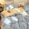 Juego de ropa de cama de cuatro piezas de terciopelo de leche de color liso, engrosado y con forro polar, que incluye una sábana bajera y una funda de edredón, adecuado para invierno