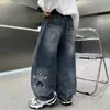 Jeans Rectos Desgastados con Estampado de Dibujos Animados para Niños Otoño 2026 Nuevos Pantalones para Niños Primavera/Otoño Pantalones de Pierna Ancha Transfronterizo
