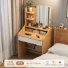 Tocador sencillo y minimalista con espejo para uso doméstico, adecuado para dormitorios pequeños, que ofrece almacenamiento fácil y múltiples funciones