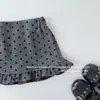 Con ShortsEstilo Coreano de lunares linda moda de otoño falda de lana con dobladillo volantes para niñas, falda corta para niñas a la moda