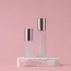 Botella de bola rodante de oro rosa de 5 ml y 10 ml al por mayor, botella de bola rodante de vidrio rosa, botella de aceite esencial, botella de perfume, botella dividida