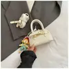 Versión Coreana Nuevo Color Sólido Versátil Bolso tipo concha Simple Moda Elegante Bolso Cruzado de Hombro para Niñas Venta al por Mayor