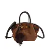 La popular bolsa de cubo tote retro de este año para mujer, nuevo estilo Otoño 2026, decoración de cinturón de cuero, bolso de hombro único, bolso cruzado para el trabajo