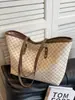 Bolso de mano sencillo y de gran capacidad para mujer, primavera 2025, nuevo bolso de mano de moda para ir al trabajo, bolso de hombro portátil de gran capacidad.