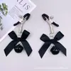 Suministro directo transfronterizo productos eróticos para adultos pinzas para pezones de campana de mariposa rosa negro clips tintineantes pinzas para pezones juguetes sexuales