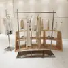 Arara de Exposição para Loja de Roupas Aço Inoxidável Piso a Teto Arara Nakajima Prateleira de Exposição para Loja de Roupas Femininas Cabide Prateado