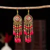 Gran oferta de pendientes de plumas vintage de estilo étnico, largos y multicolores, con diseño de cuentas y círculos.