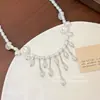 Cadena Clavicular con Borla de Perlas Estilo Retro Francés, Diseño de Nicho, Gama Alta, Lujo Ligero, Accesorio Exquisito y Personalizado