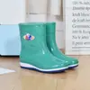 Botas de lluvia para mujer con forro polar, zapatos cálidos para todas las estaciones, zapatos impermeables de moda, zapatos de algodón de tubo alto antideslizantes, botas de lluvia, cubrezapatos de goma para invierno