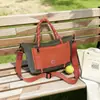 Bolso casual de gran capacidad de moda transfronteriza para mujer, nuevo estilo otoño 2026, versátil para ir al trabajo, bolso de hombro, bolso de mano y bolso cruzado