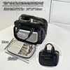 Nova bolsa de maquiagem azul claro 2026, grande capacidade, à prova d'água, com compartimentos e camadas, uma bolsa de armazenamento luxuosa e portátil