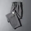 Pantalones de Hombre Verano Finos Sueltos Rectos Casuales Deportivos Elásticos Moda Coreana Pantalones Cortos de Lino