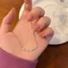 Colar de Pérolas Coreano e Japonês Mais Vendido para Mulheres Sensação de Alto Padrão Corrente de Clavícula de Prata Quebrada Design de Nicho Corrente Longa para Suéter Choker de Luxo Leve