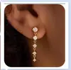 Colar de Trevo de Quatro Folhas com Zircônia Novo Estilo Europeu e Americano para Mulheres, Colar de Flor de Pérola e Concha Atacado, Pulseira de Borboleta com Contas Douradas Atacado