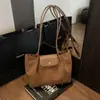 Bolsa de Camurça Outono e Inverno Feminina Grande Capacidade 2025 Nova Bolsa Casual de Ombro Axila Outono e Inverno Bolsa Retrô