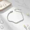 Pulsera de lujo ligero de alta gama con incrustaciones de diamantes, superventas transfronteriza europea y americana para mujer, pulsera de acero inoxidable y circonita, en stock, directo del fabricante