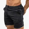 Amazon shorts de verão masculinos de secagem rápida cor sólida esportivos fitness calças de cinco pontos calças de praia fabricantes atacado