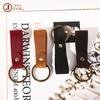 Llavero vintage de cuero hecho a mano, accesorio para llavero de piel de vaca para coche, colgante con personalidad creativa, pequeño regalo