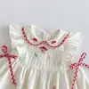 [Sin Devoluciones ni Cambios] Chaleco Bordado de Moda para Niñas 2026 Nuevo Verano Estilo Coreano para Bebé Linda Camisa de Muñeca con Mangas Volantes