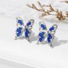 Pendientes de mariposa de diamantes de colores con incrustaciones de aguja de plata de estilo coreano, diseño simple, lindos y dulces.