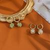 Pendientes de piedra de ojo de gato tridimensionales de sentido avanzado, ligeros, de lujo, de moda, con temperamento que combina con todo, diseño elegante, juego de pendientes con hebilla de circonita