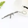 Llavero colgante de metal con rifle de francotirador de 98 quilates, modelo de arma circundante, juego de escape de pollo Jedi Survival