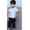 Uniforme Escolar Primário Uniforme de Classe Camiseta Polo Infantil Conjunto de Manga Curta Roupa de Coral Roupa Infantil Graduação do Jardim de Infância Roupa de Jardim Roupa de Verão