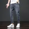 Calça jeans masculina 2026 nova primavera e outono reta solta casual longa, calça cropped masculina de outono, slim fit