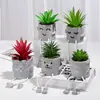 Sencilla creativa muñeca de pies colgantes cilindro de cemento simulación planta suculenta maceta sala de estar decoración del hogar fabricantes mayoreo