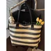 Bolsa de palha simples de grande capacidade, bolsa de ombro feminina, nova bolsa tote listrada feminina de verão 2026 atacado