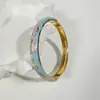 Yongge Jewelry Pulsera de Esmalte Transfronteriza Europea y Americana para Mujer Moderna Colorida Geométrica Rayada de Puntos Filigrana con Borde Dorado Accesorio de Mano