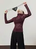 Ropa de Mujer Transfronteriza al por Mayor Artículo Caliente 2026 Otoño Versátil Capa Base Ligera y Transparente Malla Camiseta de Cuello Alto
