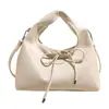 Bolso de mano con lazo estilo suave, nuevo estilo 2025 para mujer, versátil bolso cruzado tipo dumpling de piel sintética suave