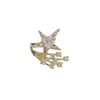 Brinco de osso de orelha com clipe de furo de orelha de meteoro com diamantes completos super flash design de moda de nicho feminino brincos de vento frio de alto padrão atacado