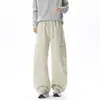 Pantalones cargo beige de pierna ancha con cordón para hombre, estilo outdoor, con grandes bolsillos con cremallera, corte holgado, caída fluida, casual, pantalones de largo completo
