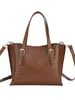 Bolso Pequeño Transfronterizo para Mujer 2026 Nuevo Diseño Retro de Nicho Bolso de Mano Tipo Cubo Bolso de Hombro Cruzado Tejido a la Moda