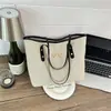 Moderna y casual, esta bolsa de mano de gran capacidad es un nuevo bolso de hombro de lona de primavera para mujer, perfecto para el uso diario