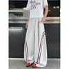 Pantalones de chándal retro americanos holgados a bloques de color a rayas para hombre, pantalones de verano fluidos de pierna ancha, pantalones casuales holgados, versátiles