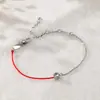 Pulseira de corda vermelha festiva de Ano Novo com zircônia para homens e mulheres pulseira de tornozeleira de aço inoxidável estilo chinês pulseira da sorte atacado de fábrica