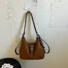 Bolsa de Ombro Única Grande Capacidade Versátil Outono/Inverno Nova para Mulheres Fashion 2026 Tendência Temperamento Transversal Dupla Ombro Casual Simples