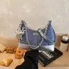 Bolso casual de moda de primavera, diseño de nicho, bolsa de albóndiga texturizada 2026, bolso cruzado y de hombro personalizado para mujer