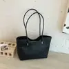 2026 Verano Nuevo Retro Textura Simple Moda Bolso Cubo Color Sólido Nicho Casual Alto Valor Bolso de Hombro Tendencia