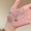 Pin de Iris Francés Plateado Cepillado Collar Saturno para Mujer con Incrustación de Diamante Rosa Cadena de Suéter de Gama Alta de Nicho Accesorio de Moda