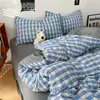 Juego de ropa de cama de cuatro piezas de algodón lavado estilo retro simple, amigable con la piel y suave, sábana y funda de edredón, juego de tres piezas para dormitorios estudiantiles