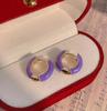 Nuevo estilo de alta gama goteo de aceite rojo hebilla de oreja irregular Corea del Sur simple para todo diseño nicho aretes personalizados moda