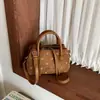 Bolso de mano de moda coreana de nicho retro de lunares, nuevo modelo 2026, bolso de hombro y cruzado versátil de alta gama