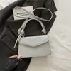 Bolso de Mujer Estilo Coreano Personalizado de Moda para el Trabajo Nuevo Estilo 2026 Bolso Cuadrado Pequeño de Temperamento a la Moda para Hombro Cruzado de Mano para Mujeres