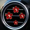 Pequeño crisantemo perfume para coche joyería aleación pequeña margarita flor de cinco pétalos flor clip decoración salida de aire del coche perfume
