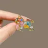 Broche de Pony de Cristal Colorido para Mujer 2025 Nuevo Diseño de Alta Gama Lujo Accesible Accesorios de Pines de Diseño de Nicho